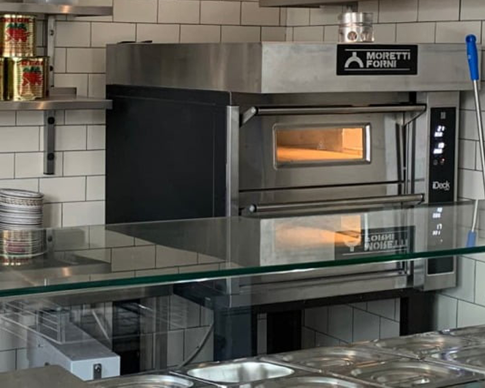Pizza Restaurant kitchen with a Moretti Forni iDeck pizza oven
