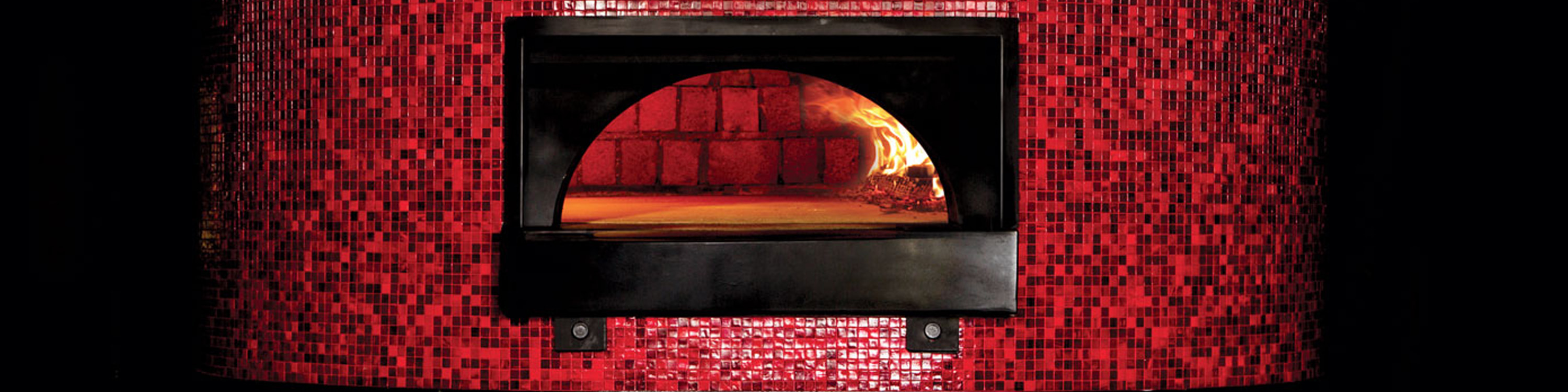 the flame in a wood fired commercial pizza oven